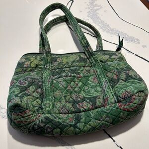 Vera Bradley bag in primarily dark green with hints of purple